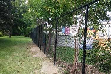 Installation de clôture Frost (mailles de chaîne) sur la Rive-Nord