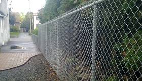 Installation de clôture frost à maille de chaîne sur la Rive-Nord